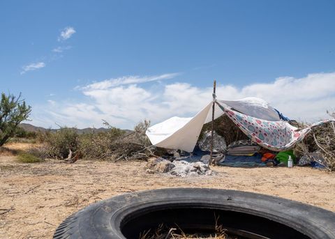 a makeshift tent in the desert