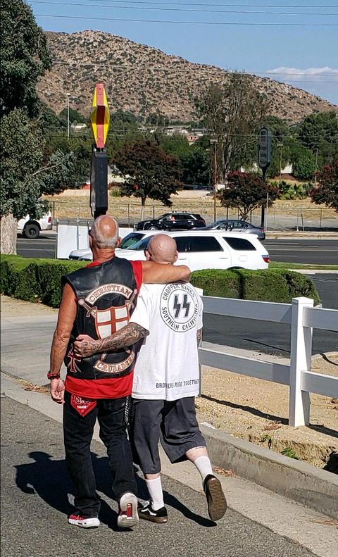 'Christian Crusaders' and Ryan Van De Car leaving the protest together. You can see the SS bolts on Van De Car's shirt clearly. Photo by 'Jen'