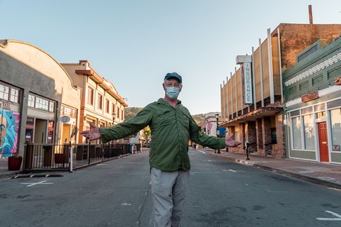 Long-time Martinez resident Ken King poses for a photo in the deserted downtown in Martinez, Calif., on Sunday, July 12, 2020.