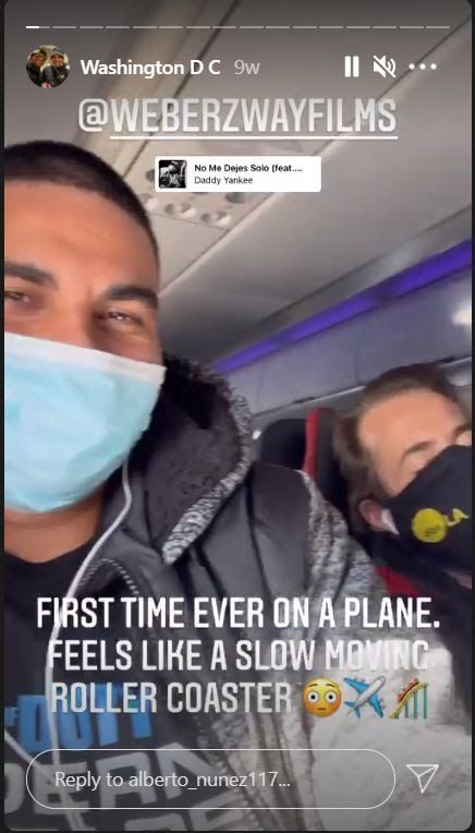 Screenshot of a video of Nunez and Weber sitting next to each other on an airplane. Nunez captions it 'First time on an airplane. Feels like a slow moving rollercoaster.'