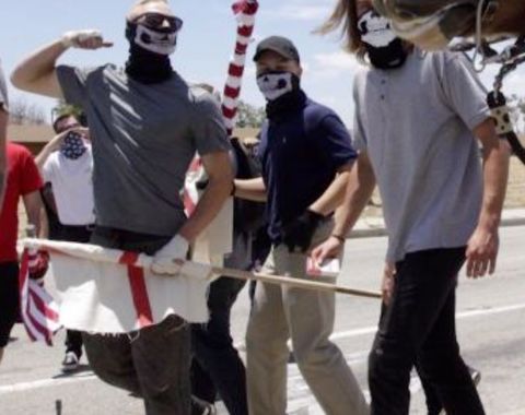 Ryan (center, blue polo) marches alongside Benjamin Daley at the anti-Sharia law San Bernadino protest June 10th, 2017