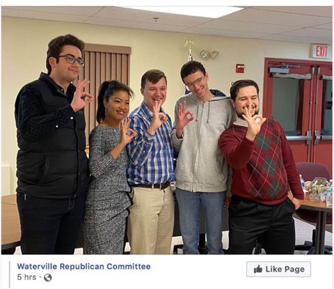 Jeremiah Childs (center) poses with other U of Maine College Republicans during Michelle Malkins visit