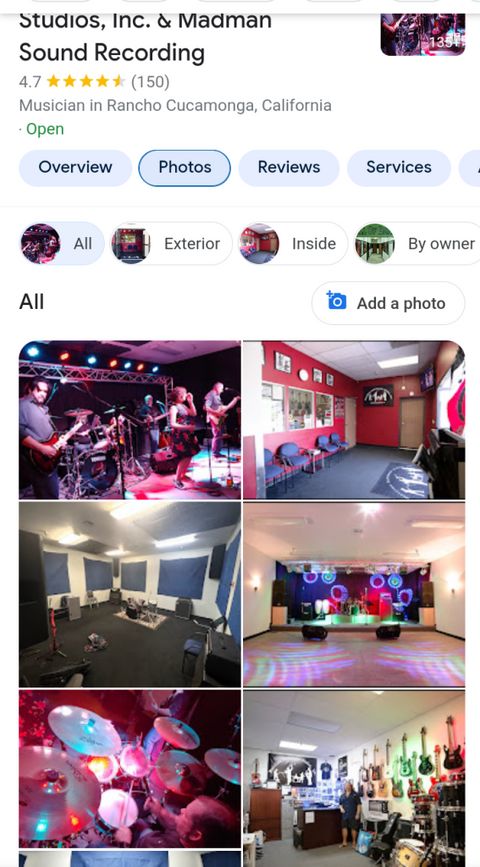 Google image search of Musician Performance Studios showing the same room with blue hanging cloth that Dilley played in