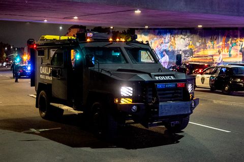 An Oakland Police Department BearCat — an armored personnel carrier often used by militaries and police forces — sits on Grand Avenue in Oakland, Calif., August 26, 2020.