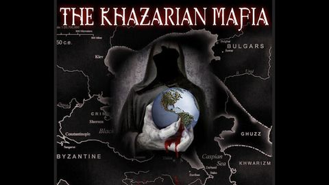 This video thumbnail has text at the top of the frame. The text reads, "The Khazarian Mafia" in a font chosen to appear stereotypically Eastern European. The text also glows red. Below that is a map of Eastern Europe and Central Asia, marked by the Caspian Sea and historical states such as Byzantine and Ghuzz. In the middle of the frame, laid overtop the map, is a hooded figure clutching the globe. The figure's hand is pale and clawed, and it is digging into the earth until it bleeds. The earth and the blood are the elements presented in color, outside of the title of the video.