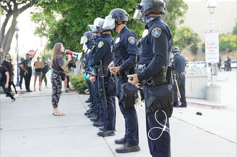 The police line moments after the arrests. Photo by Tom Mann.