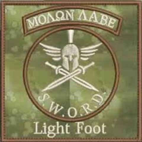 Light Foot militia patch. It reads in Greek letters 'Molon Labe' or 'Come and take it,' a phrase mythically dating back to the Spartans and used as a rallying cry for Second Amendment concerns. It also reads S.W.OR.D. which stands for 'Select Weapons, Ordinance and Reconnaissance Detachment.'