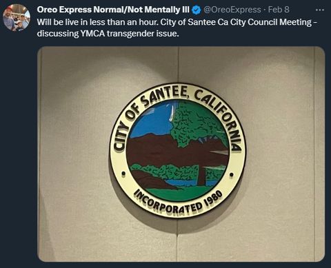 This is an image of a tweet by Josh Fulfer. His display name is "Oreo Express Normal/Not Mentally Ill." His tag is OreoExpress. The tweet reads: "Will be live in less than an hour. City of Santee Ca City Council Meeting - discussing YMCA transgender issue." 
Fulfer attached an image of the seal of the city of Santee.